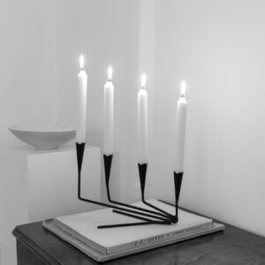 Four-armed candle holder