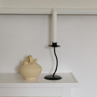 One-armed candle holder