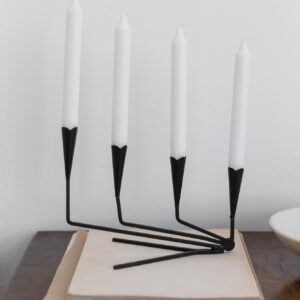 Four-armed candle holder