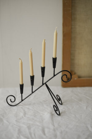 Delicate black candle holder