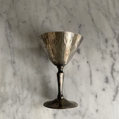 Vintage silver cup with patina and decorative pattern