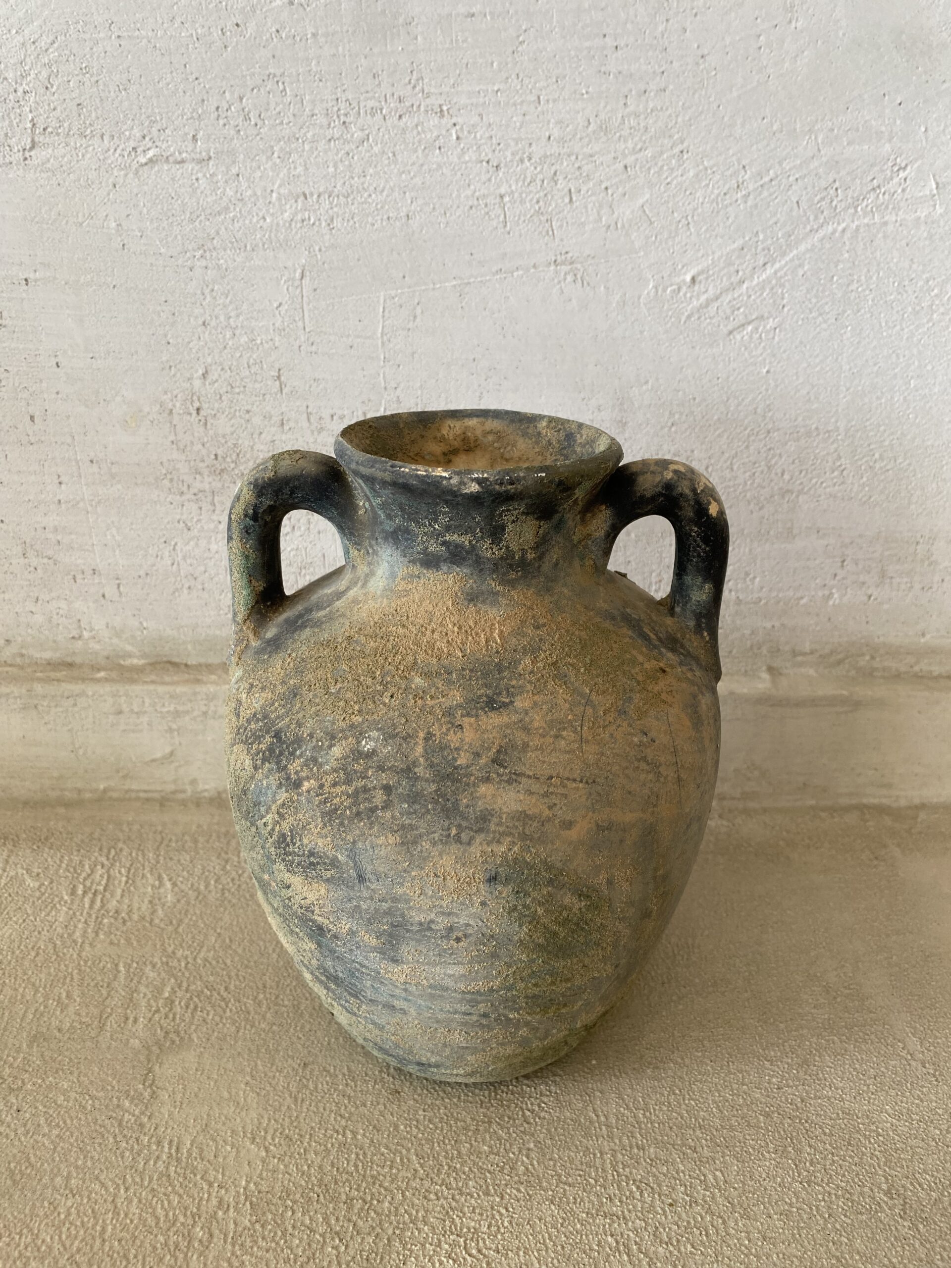 Rustic vintage jug with handles