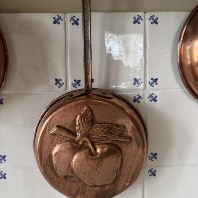 Copper pan adornment