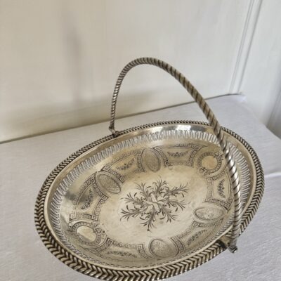 A superb antique silver swing handle basket with pierced work silver body and bead borders. Lovely classical style