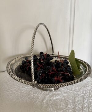 A superb antique silver swing handle basket with pierced work silver body and bead borders. Lovely classical style