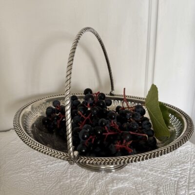 A superb antique silver swing handle basket with pierced work silver body and bead borders. Lovely classical style